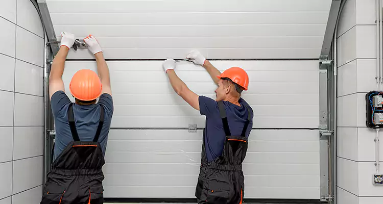 Garage Door Bottom Panel Repair in Lutz, FL